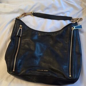 Michael Kors Black Hobo Bag with Gold Accents